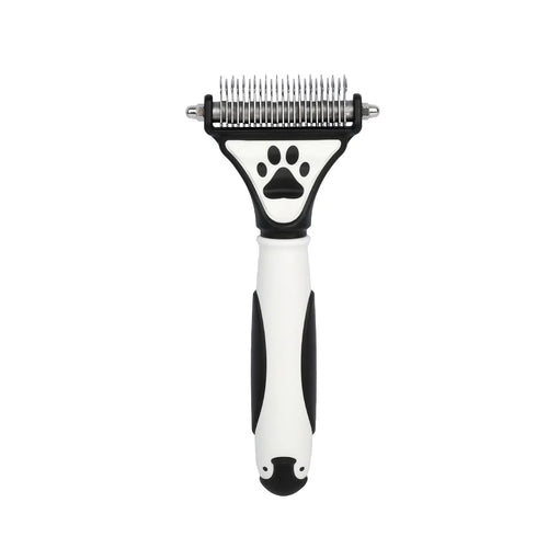 Black and white dog dematting comb with ergonomic handle and paw print design - HoodHound grooming tool